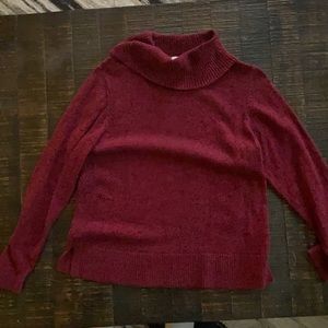Red and black loose turtleneck sweater